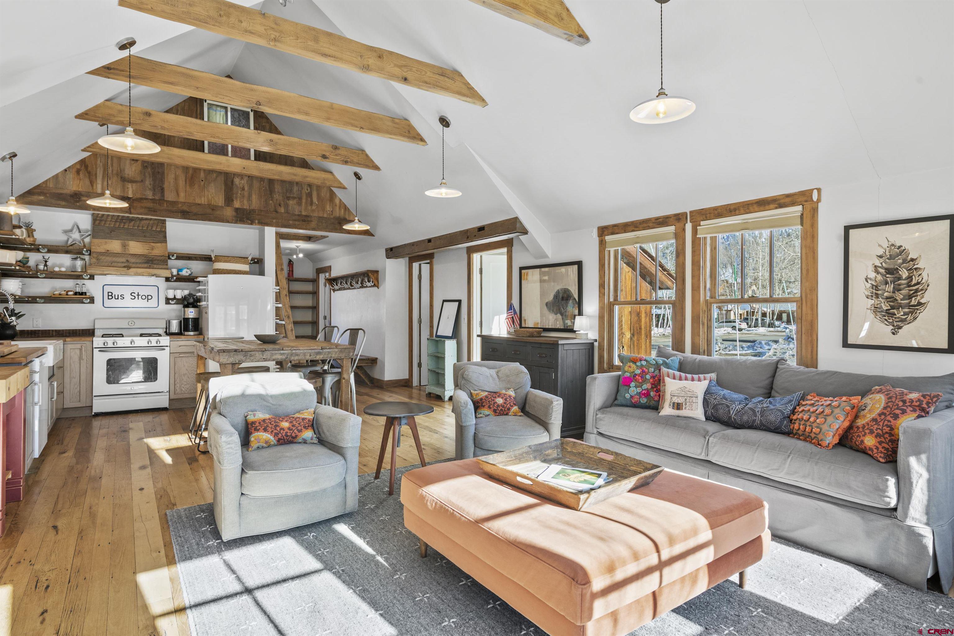 640 Elk Avenue Crested Butte, CO 81224 - Photo 26 of 45 a living room with furniture and a flat screen tv