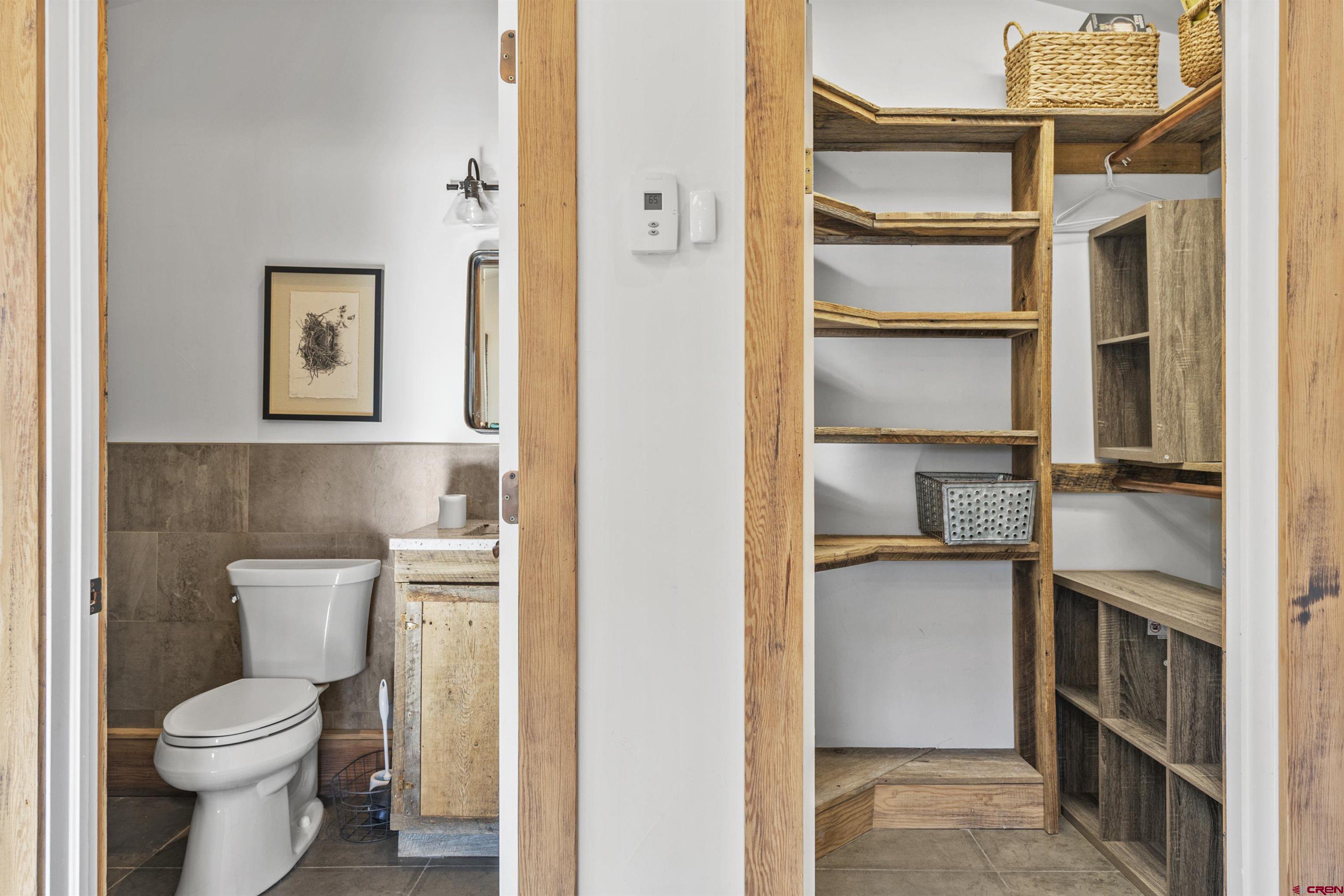 640 Elk Avenue Crested Butte, CO 81224 - Photo 45 of 45 a bathroom with a toilet sink and a window