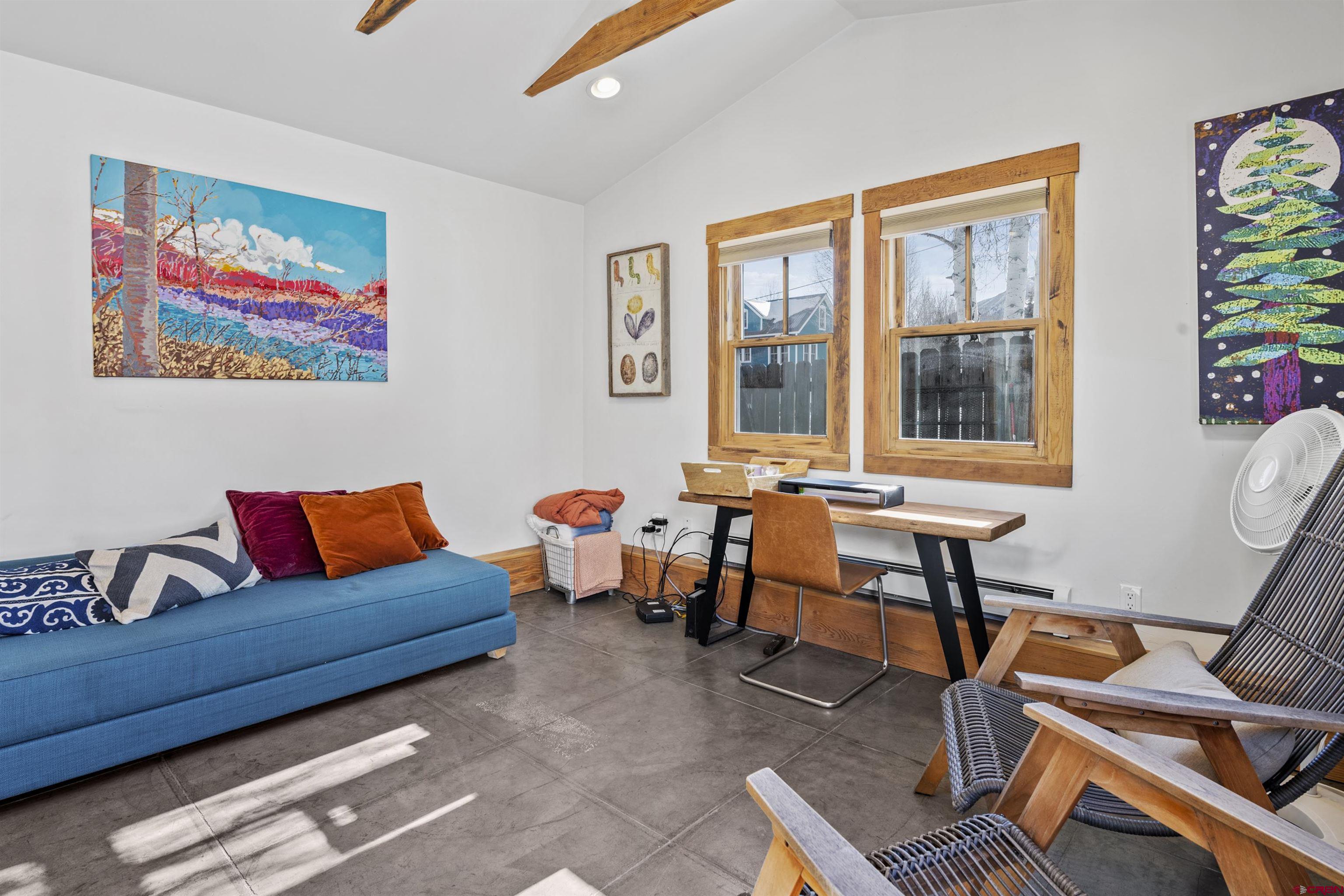 640 Elk Avenue Crested Butte, CO 81224 - Photo 8 of 45 a living room with furniture and a window
