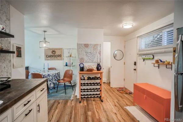 a view of a living room and dining room