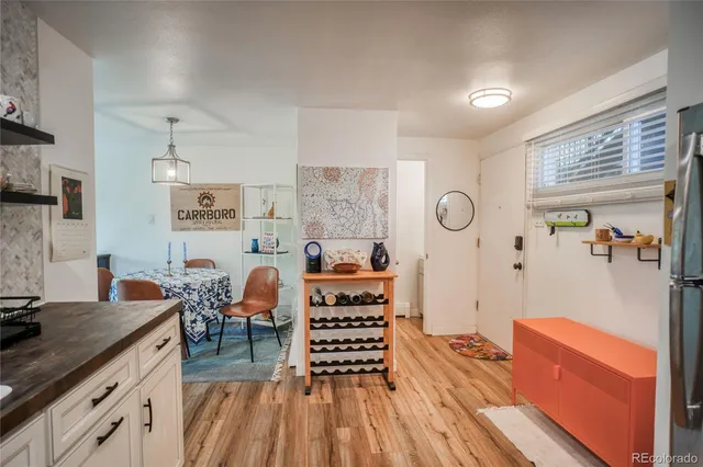 a view of a living room and dining room
