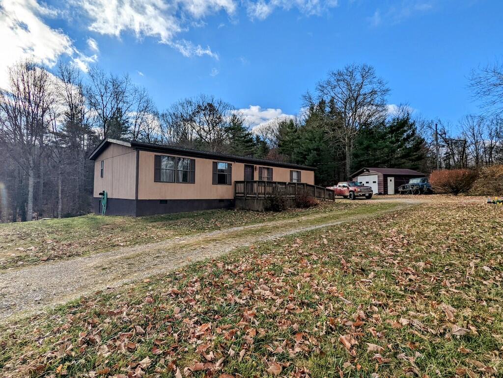 1555 Coles Knob Road Northeast Check, VA 24072 - Photo 1 of 27 a view of a house with a yard