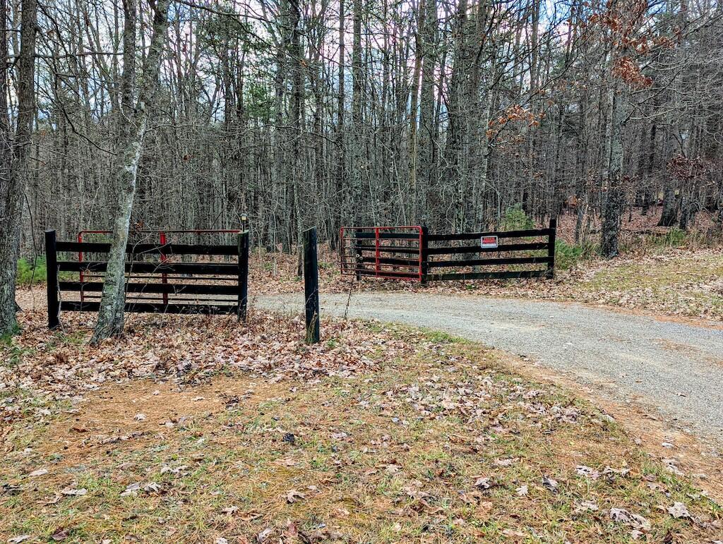 1555 Coles Knob Road Northeast Check, VA 24072 - Photo 13 of 27 a view of a bench in a backyard