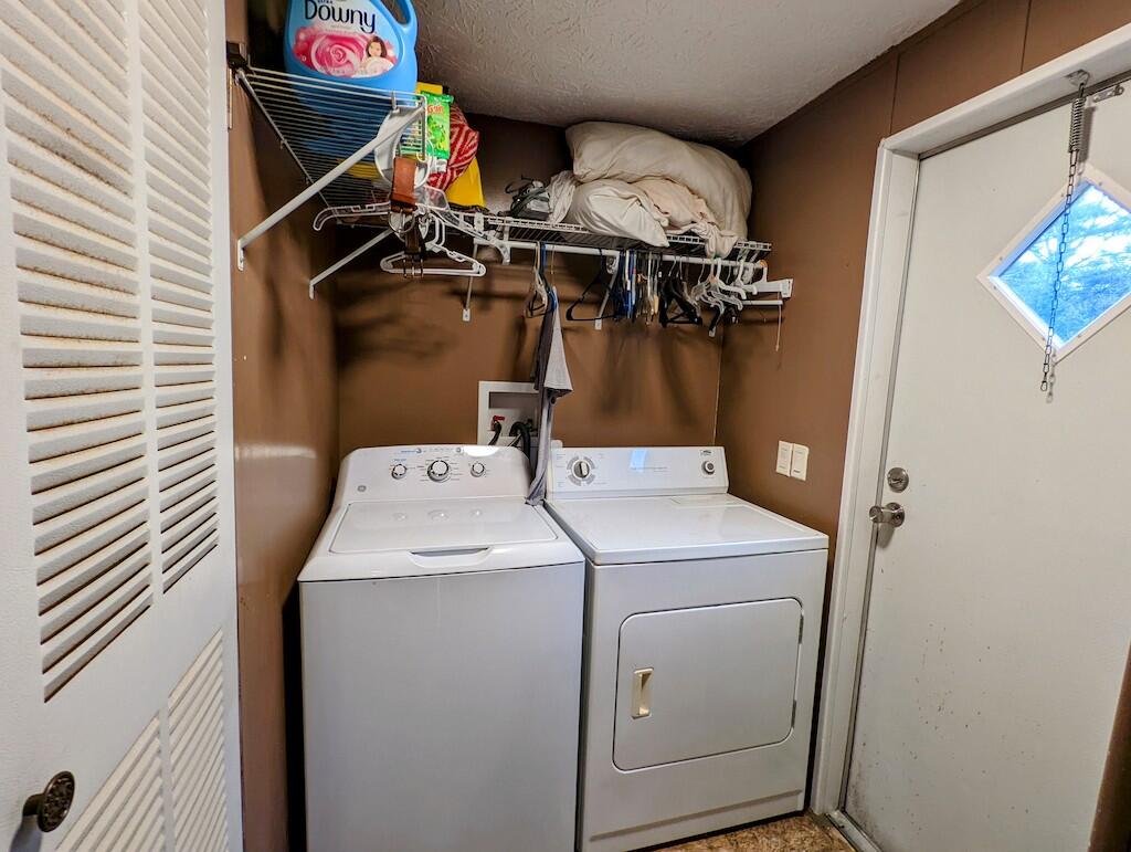 1555 Coles Knob Road Northeast Check, VA 24072 - Photo 6 of 27 a utility room with dryer and washer