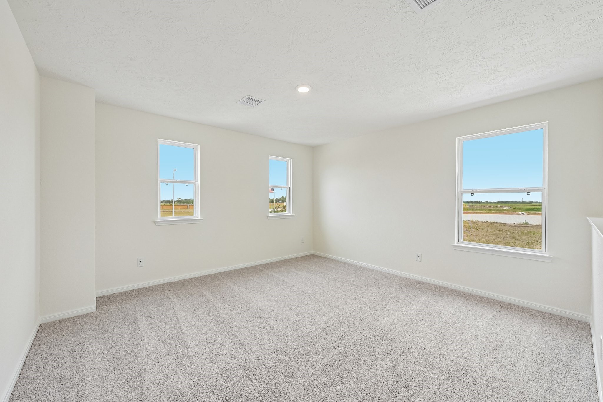 2503 Spruce Hl Road Beasley, TX 77417 - Photo 13 of 25 Head upstairs and enjoy the Loft—an additional living area perfect for a game room, media space, or a peaceful retreat.
