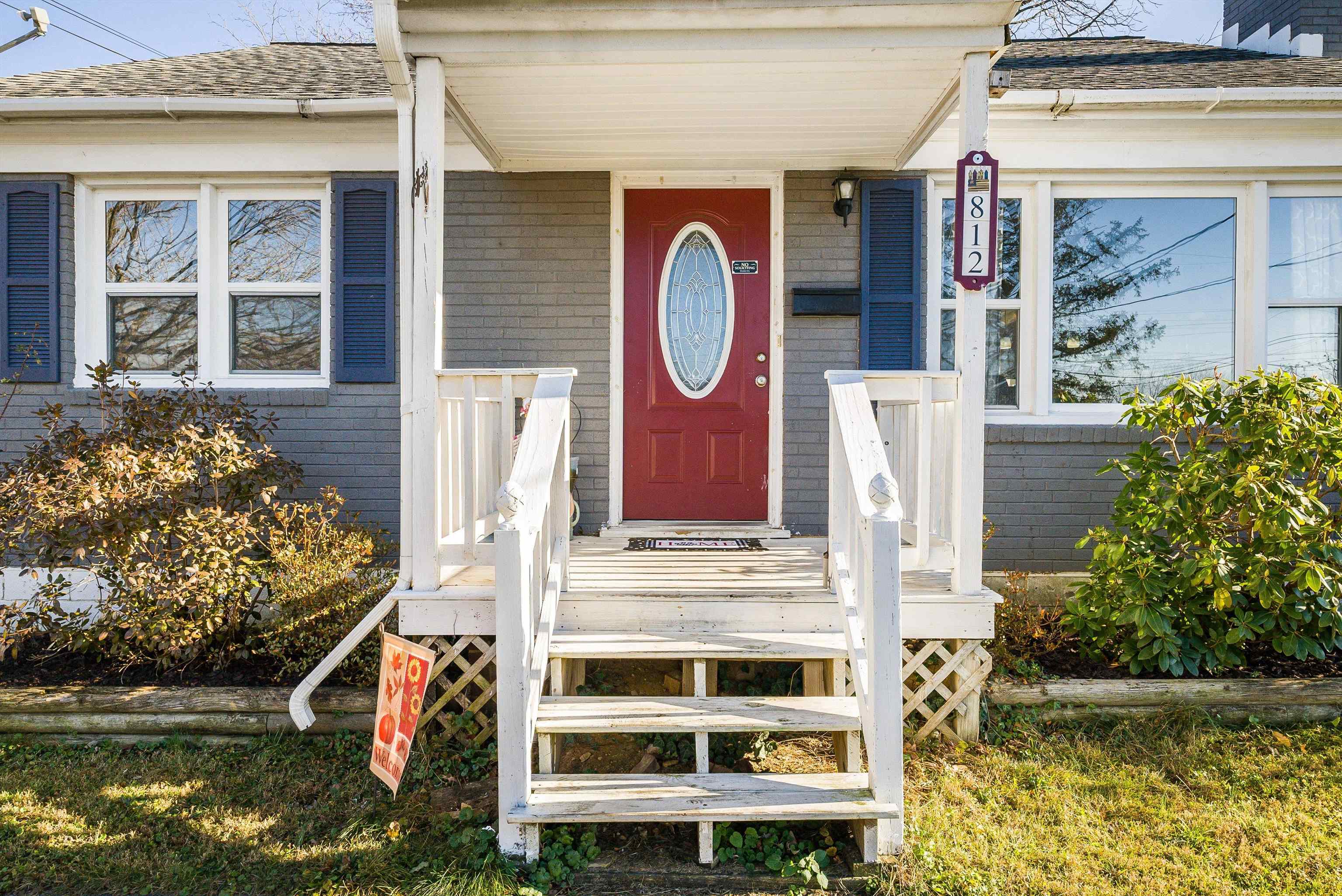 812 Florence Avenue Waynesboro, VA 22980 - Photo 3 of 24 a front view of a house with a garden and plants