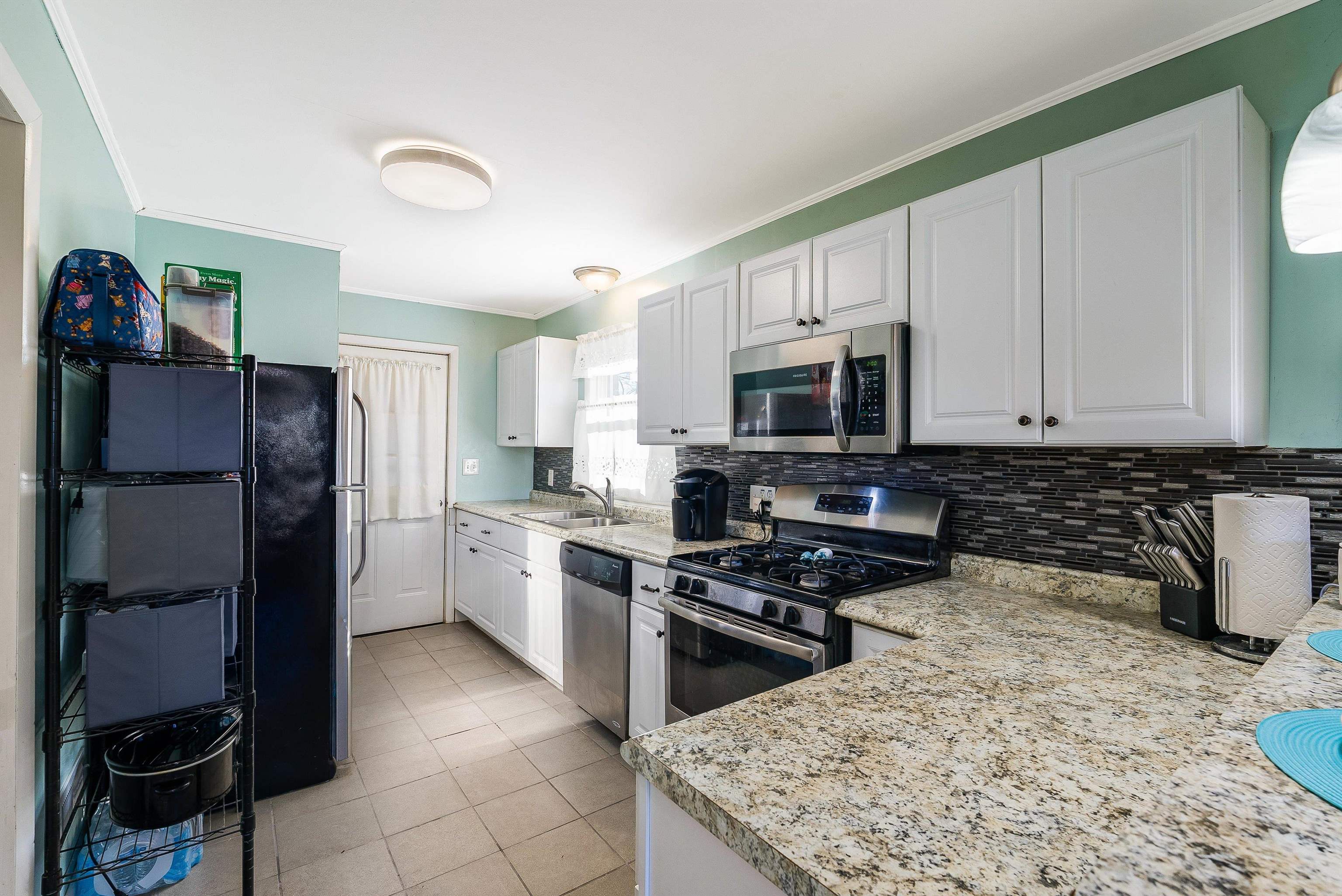 812 Florence Avenue Waynesboro, VA 22980 - Photo 8 of 24 a kitchen with a refrigerator stove and microwave