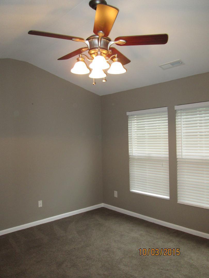 8521 Silhouette Place Raleigh, NC 27613 - Photo 11 of 20 an empty room with a window