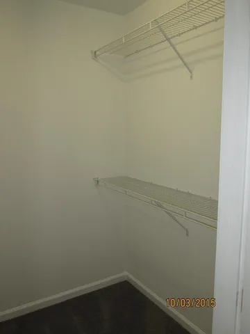 a view of small space with racks on the wall