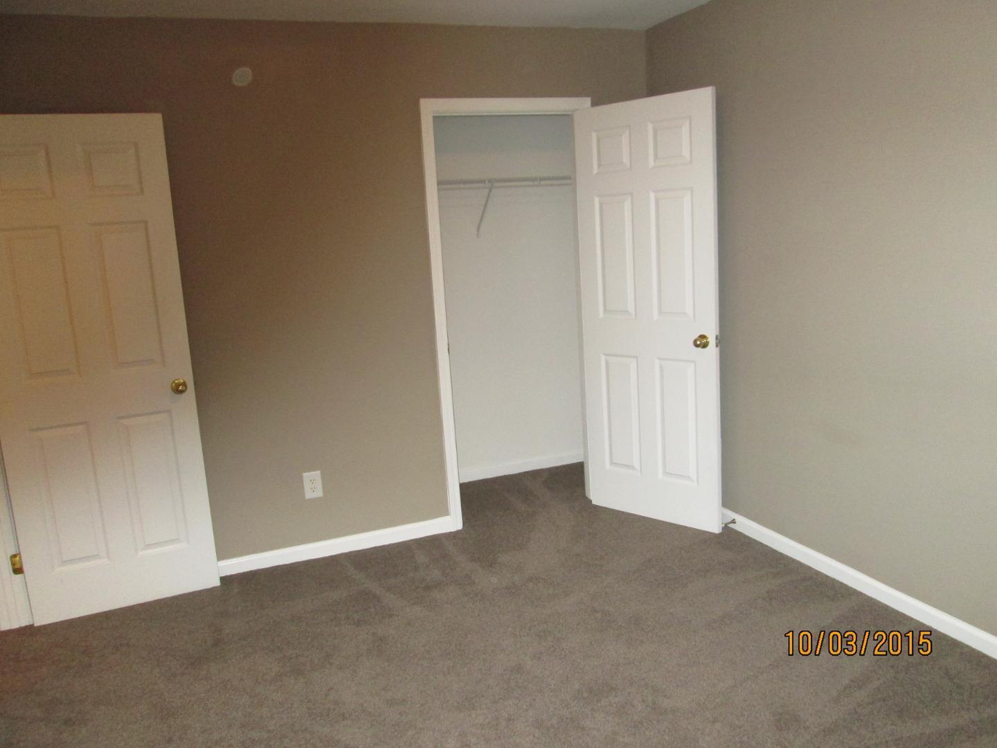8521 Silhouette Place Raleigh, NC 27613 - Photo 15 of 20 an empty room with closet area