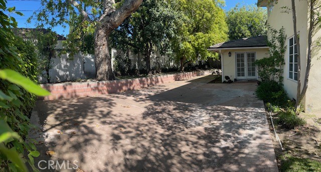 1637 Rodeo Road Arcadia, CA 91006 - Photo 21 of 29 a front view of a house with a yard and tree s