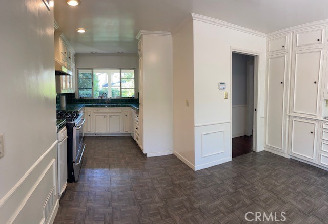 1637 Rodeo Road Arcadia, CA 91006 - Photo 22 of 29 a kitchen with a refrigerator and a stove