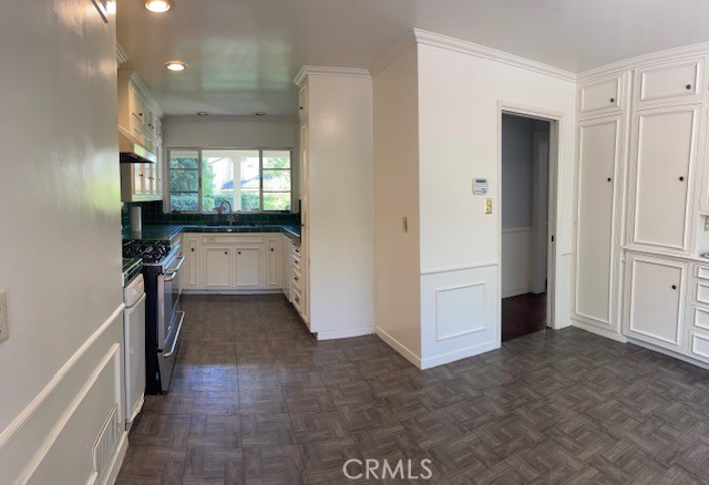 1637 Rodeo Road Arcadia, CA 91006 - Photo 8 of 29 a kitchen with a refrigerator and a stove