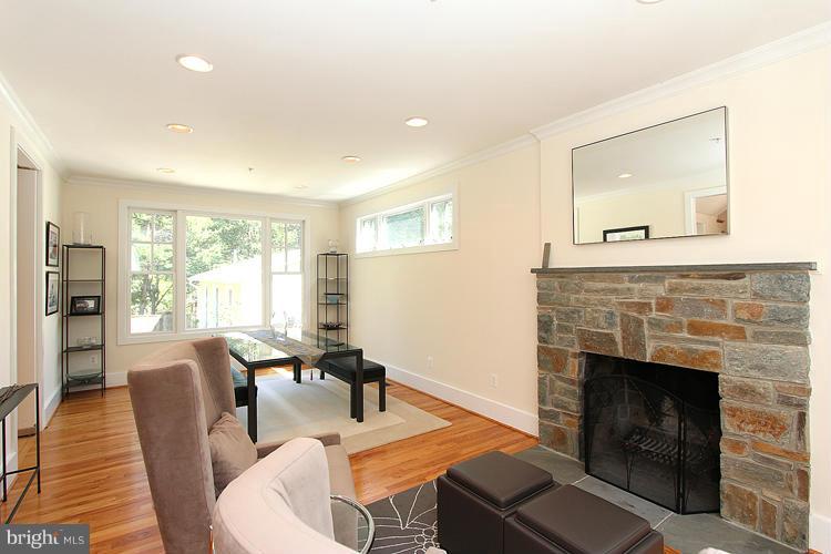 7605 Arden Road Cabin John, MD 20818 - Photo 5 of 28 Living Room with Wood Burning Fireplace