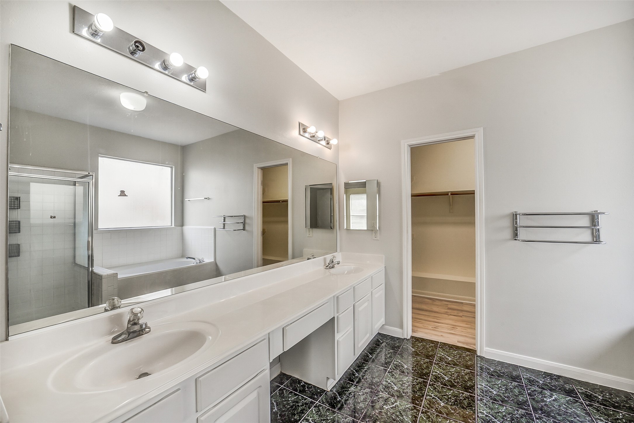 3502 Sweetspire Road Katy, TX 77449 - Photo 16 of 30 A spacious bathroom with double sink for comfort.