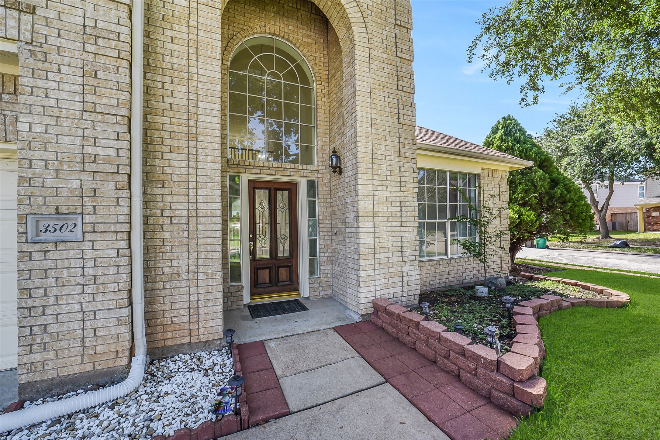 3502 Sweetspire Road Katy, TX 77449 - Photo 3 of 30 Step into a bright and welcoming entrance filled with an abundance of windows that flood the space with natural light.