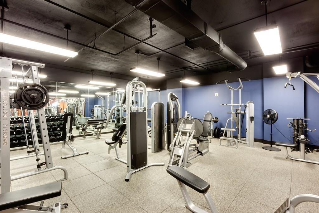 1101 Juniper Street Northeast, Unit 1416 Atlanta, GA 30309 - Photo 39 of 48 a view of a room with gym equipment