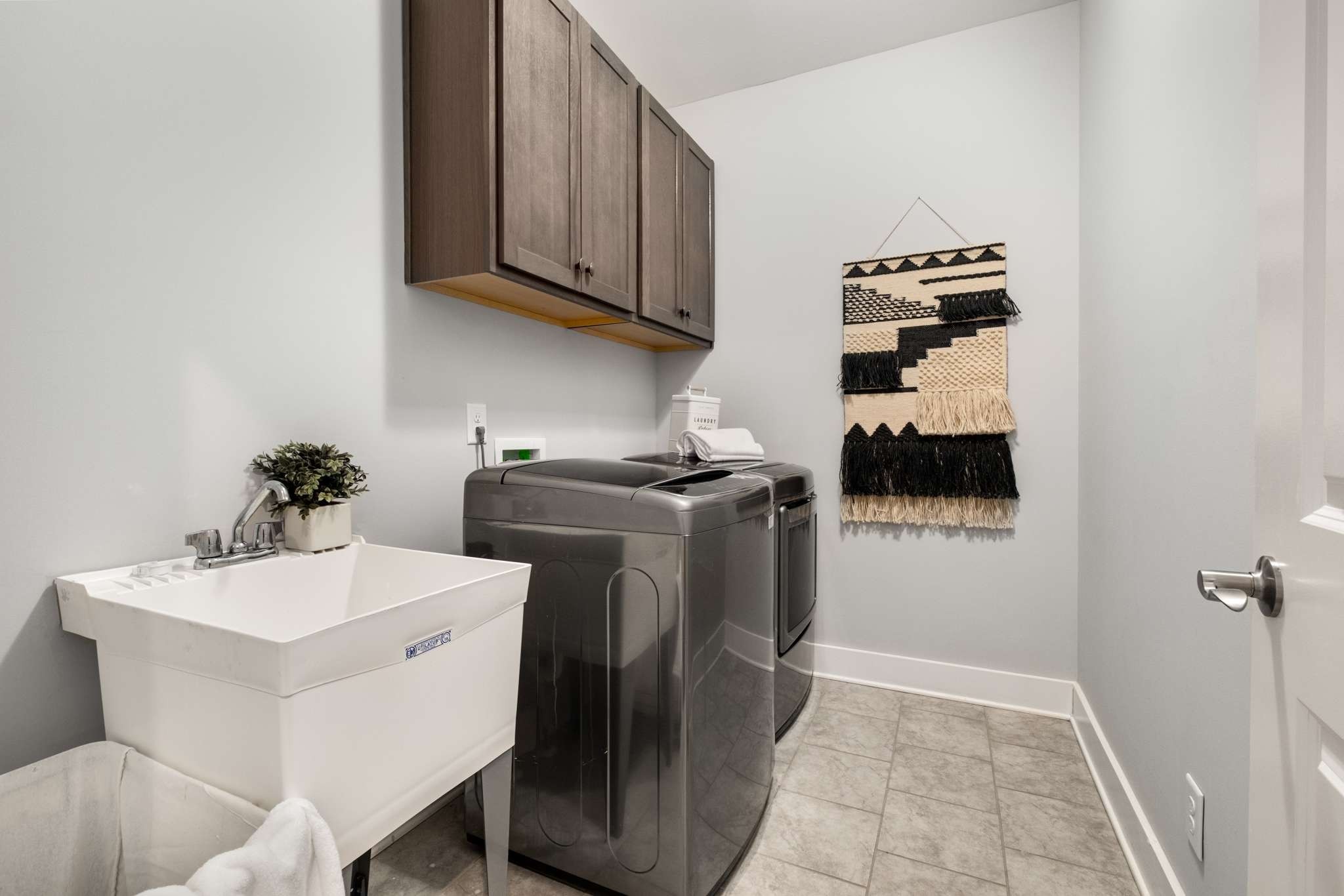 445 RANGELAND Road Spring Hill, TN 37174 - Photo 26 of 55 a utility room with sink dryer and washer