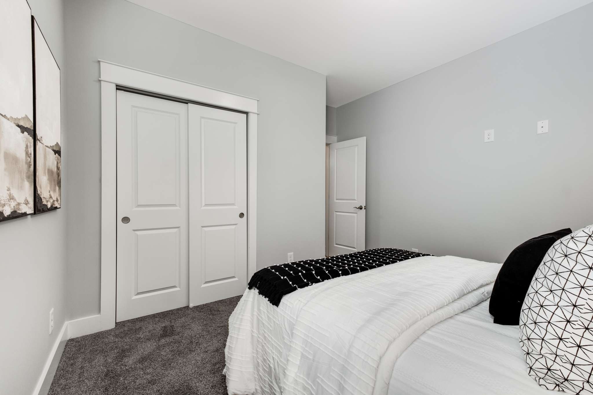 445 RANGELAND Road Spring Hill, TN 37174 - Photo 28 of 55 a bedroom with a bed and a painting on the wall