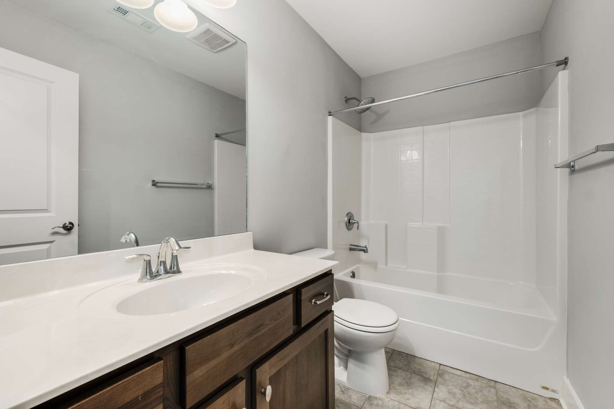 445 RANGELAND Road Spring Hill, TN 37174 - Photo 32 of 55 a bathroom with a sink a toilet and shower