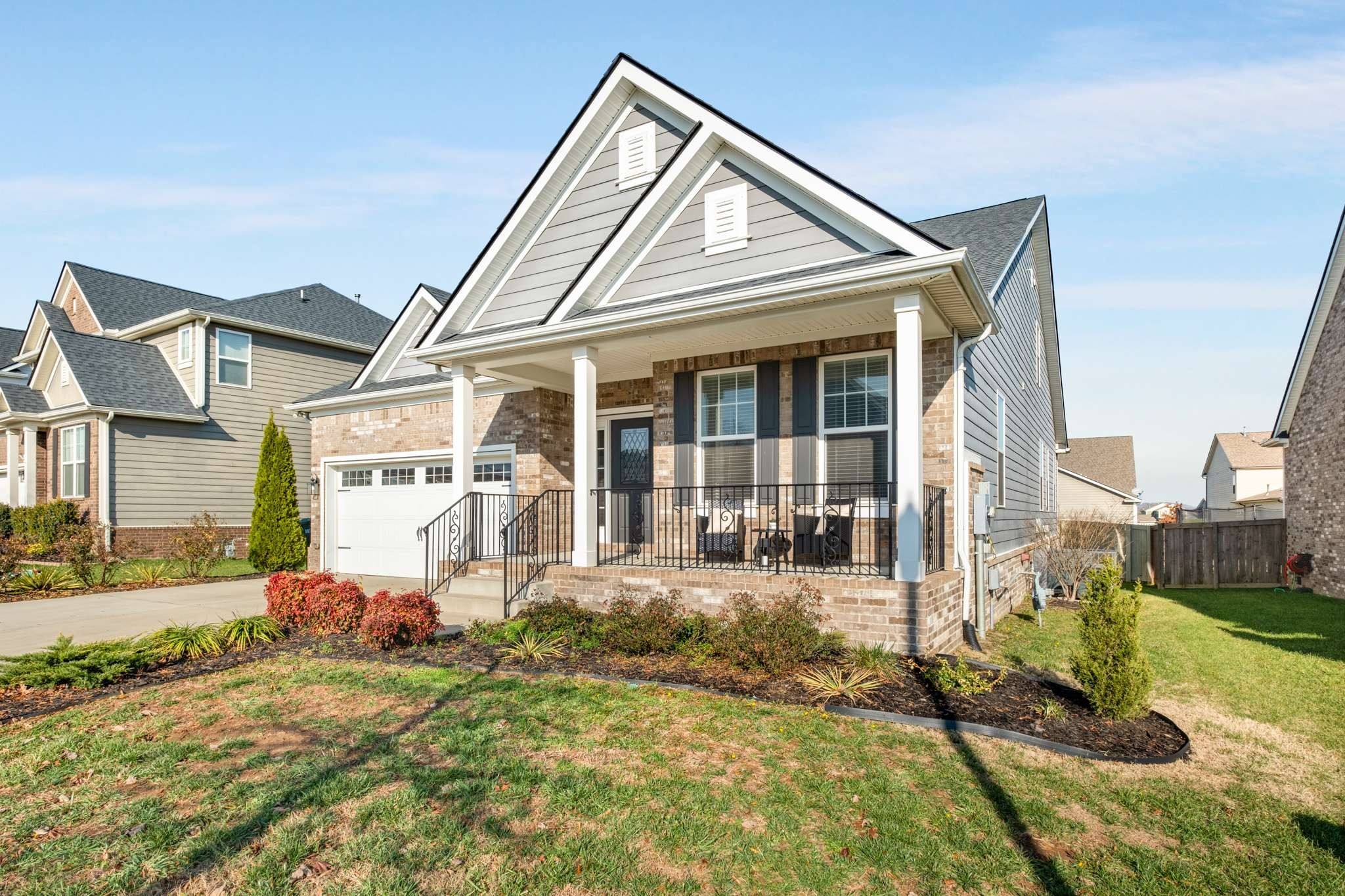 445 RANGELAND Road Spring Hill, TN 37174 - Photo 45 of 55 a front view of a house with garden