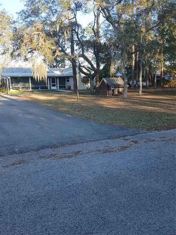 a view of road with trees