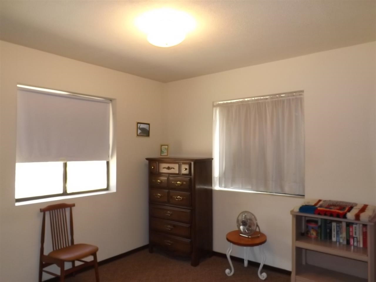 2874 Cattle Trail Road Overgaard, AZ 85933 - Photo 17 of 27 a room with a closet and a window