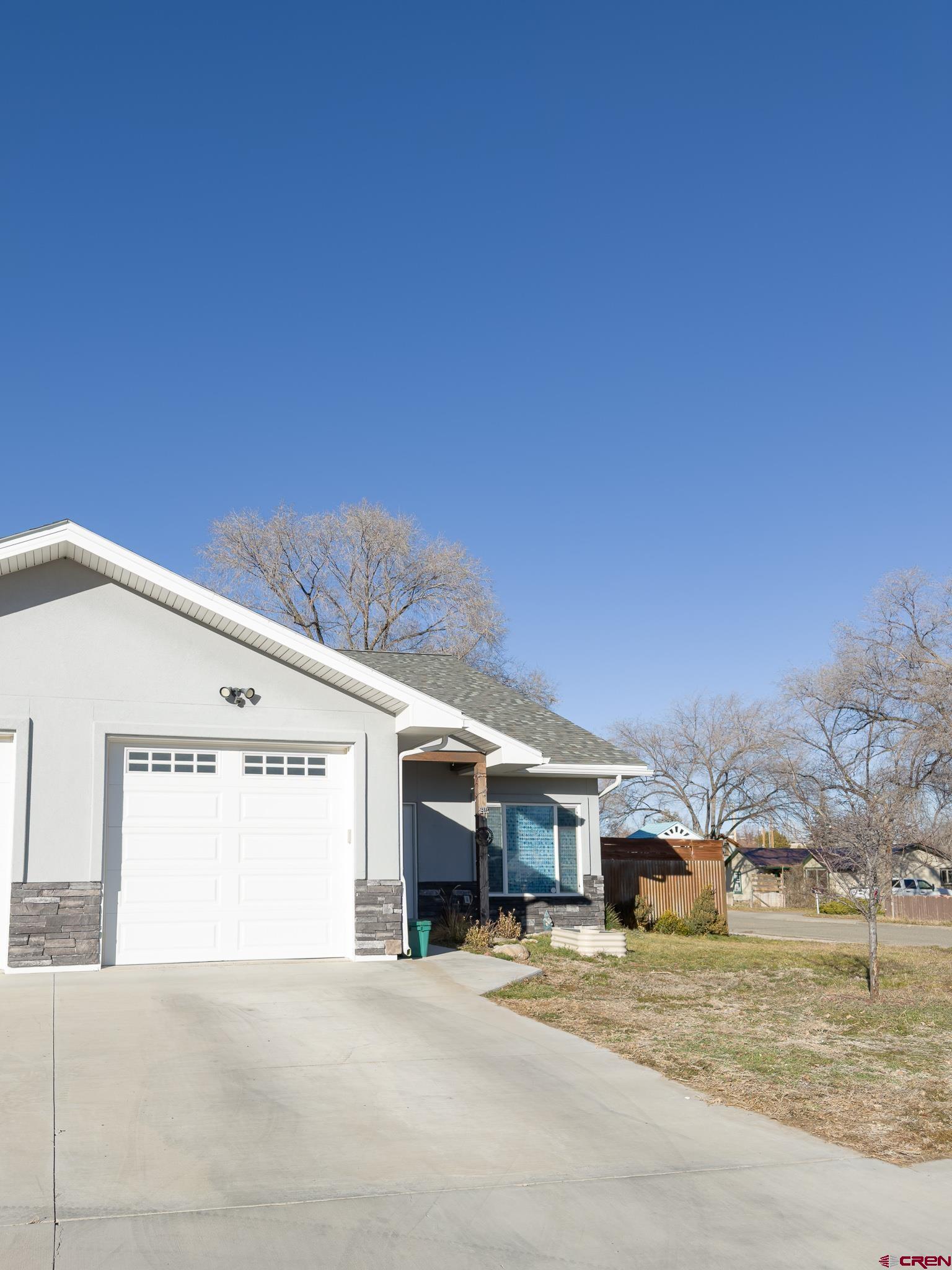 210 West 3rd Street, Unit 4 Cortez, CO 81321 - Photo 2 of 35 a view of a house with a patio