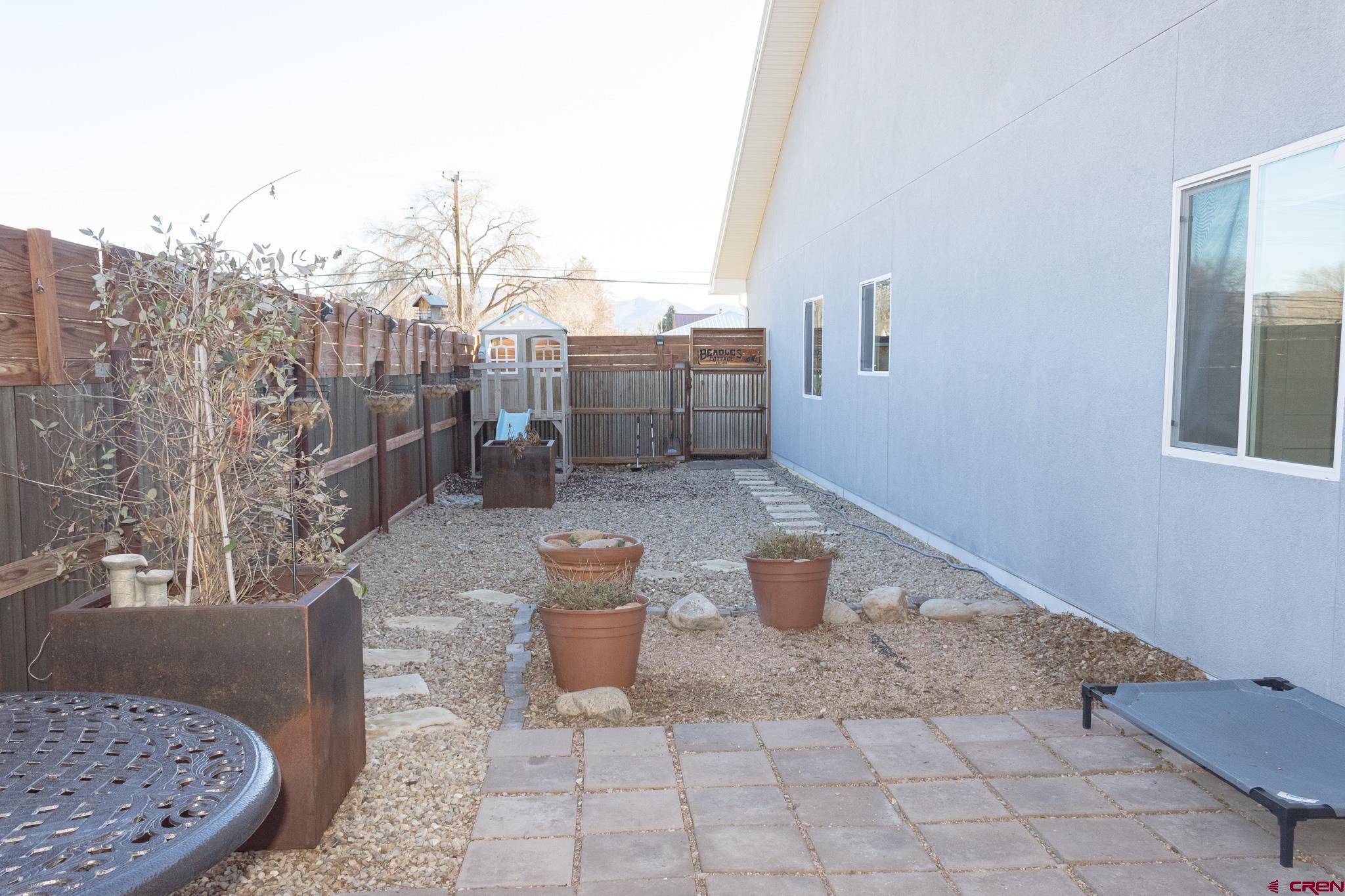 210 West 3rd Street, Unit 4 Cortez, CO 81321 - Photo 26 of 35 a view of a terrace with chairs