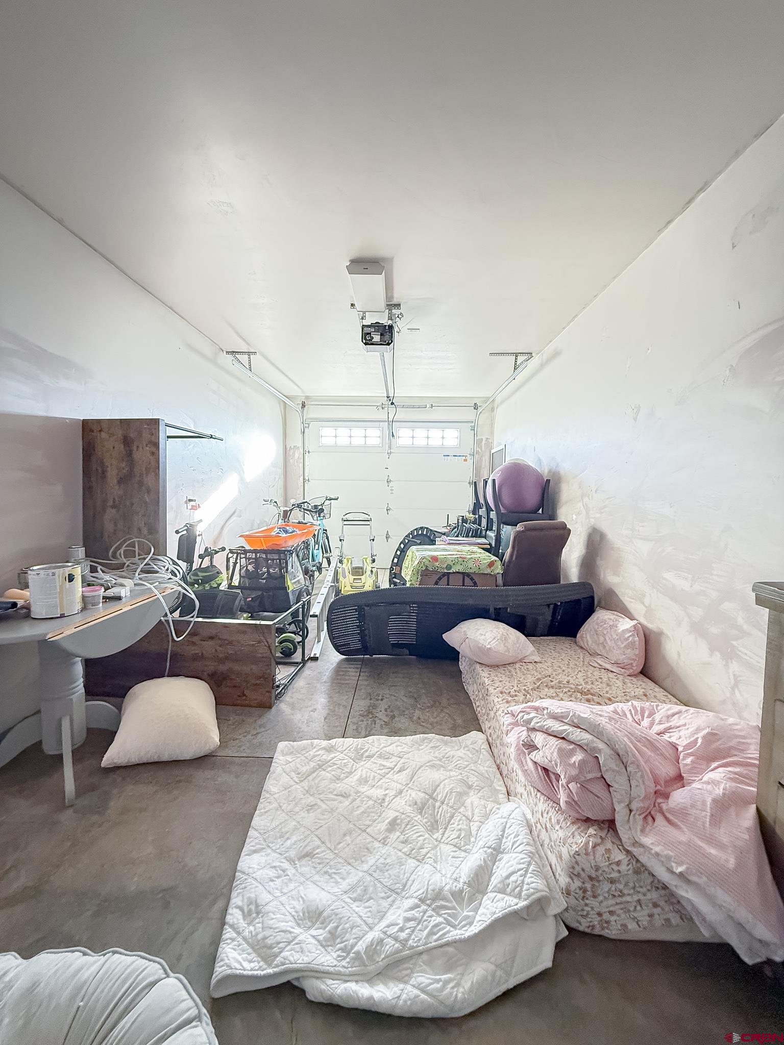 210 West 3rd Street, Unit 4 Cortez, CO 81321 - Photo 34 of 35 a living room with furniture and a window