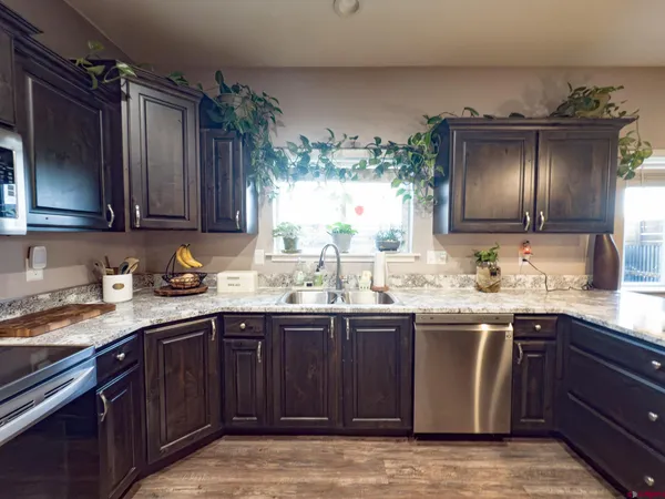 a kitchen with a sink and cabinets