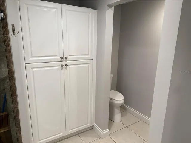 a bathroom with a sink a toilet and a bathtub