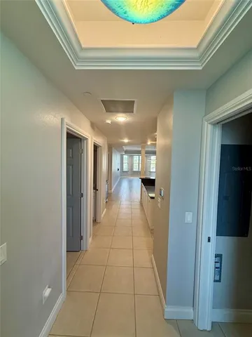 a view of a hallway with a furniture