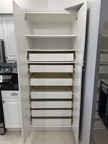 a view of a kitchen from the hallway