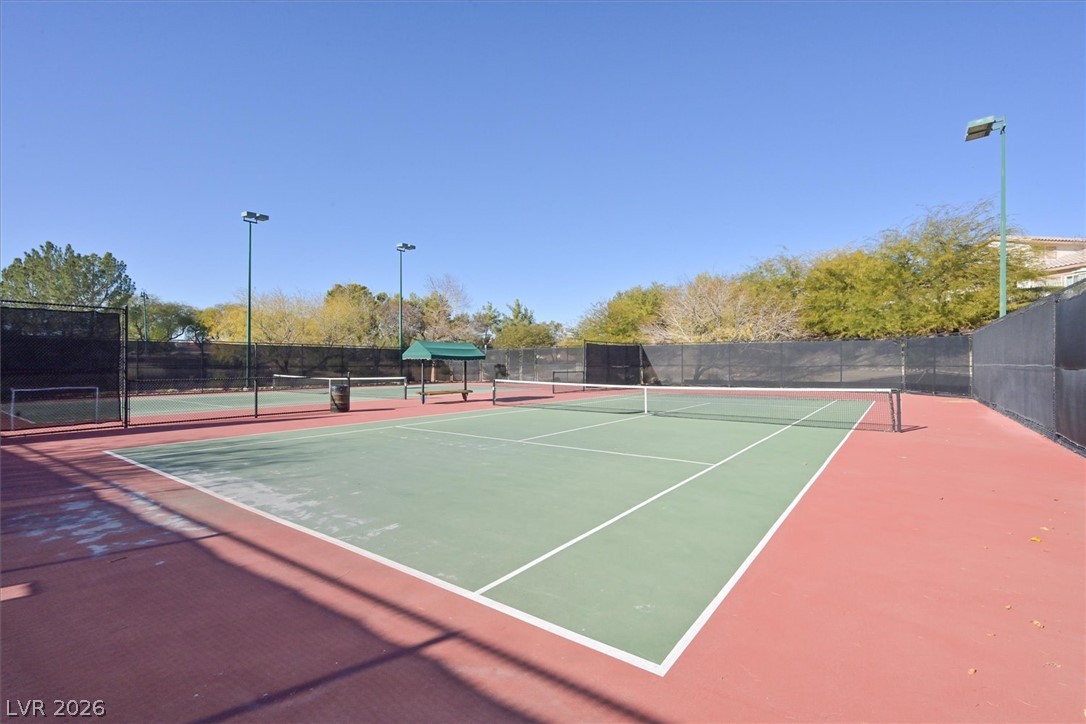 1259 Moon Vision Street Henderson, NV 89052 - Photo 48 of 53 Two hard surface courts with wind screens offer competitive play in a secluded setting.