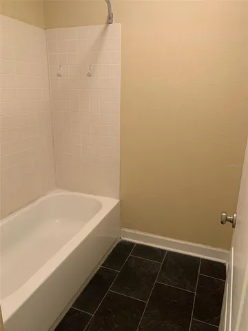 a bathroom with a bathtub