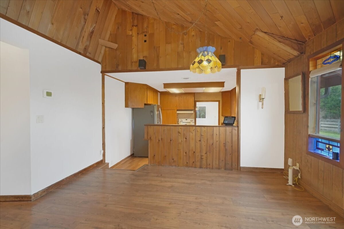 283 Sargent Road Winlock, WA 98596 - Photo 11 of 39 a view of a hallway with wooden floor