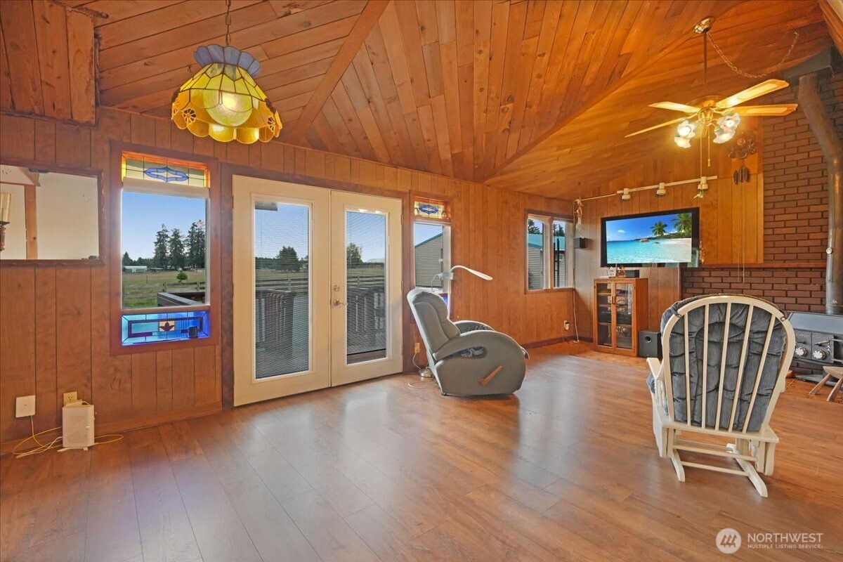 283 Sargent Road Winlock, WA 98596 - Photo 12 of 39 a view of a dining room with furniture and chandelier