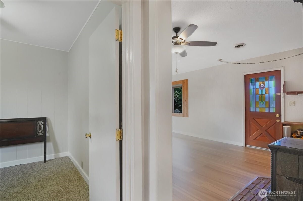 283 Sargent Road Winlock, WA 98596 - Photo 17 of 39 a view of a hallway with workspace and entryway