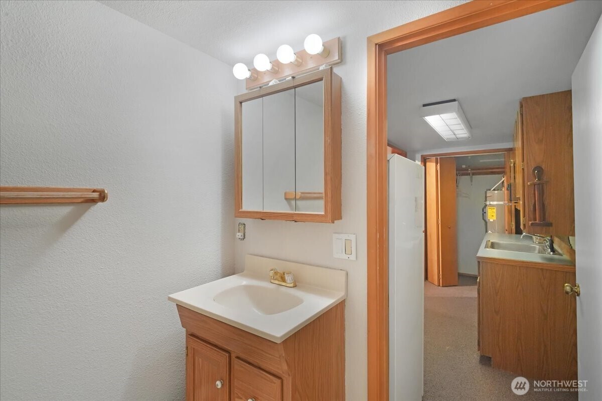 283 Sargent Road Winlock, WA 98596 - Photo 28 of 39 a bathroom with a sink and a mirror