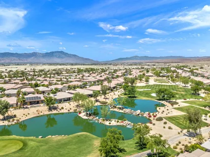 an aerial view of residential building and lake view