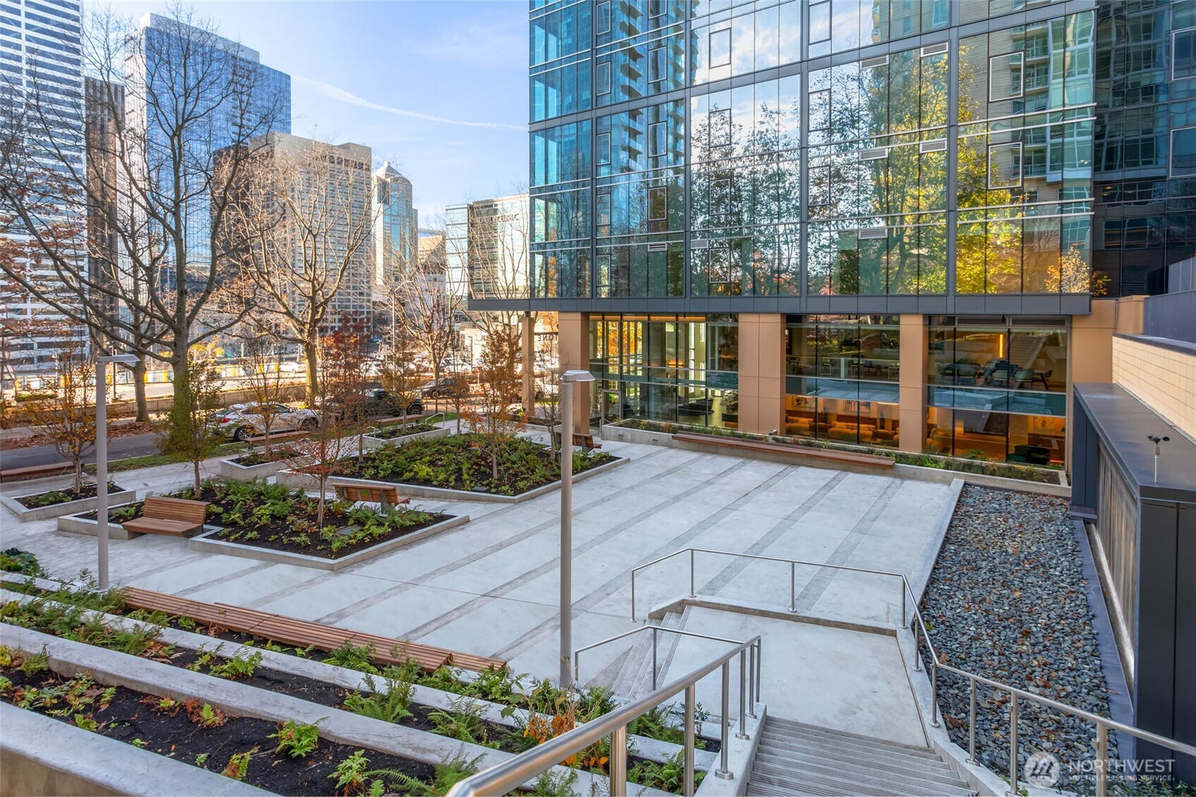 800 Columbia Street, Unit 1109 Seattle, WA 98104 - Photo 37 of 40 a city view with tall buildings