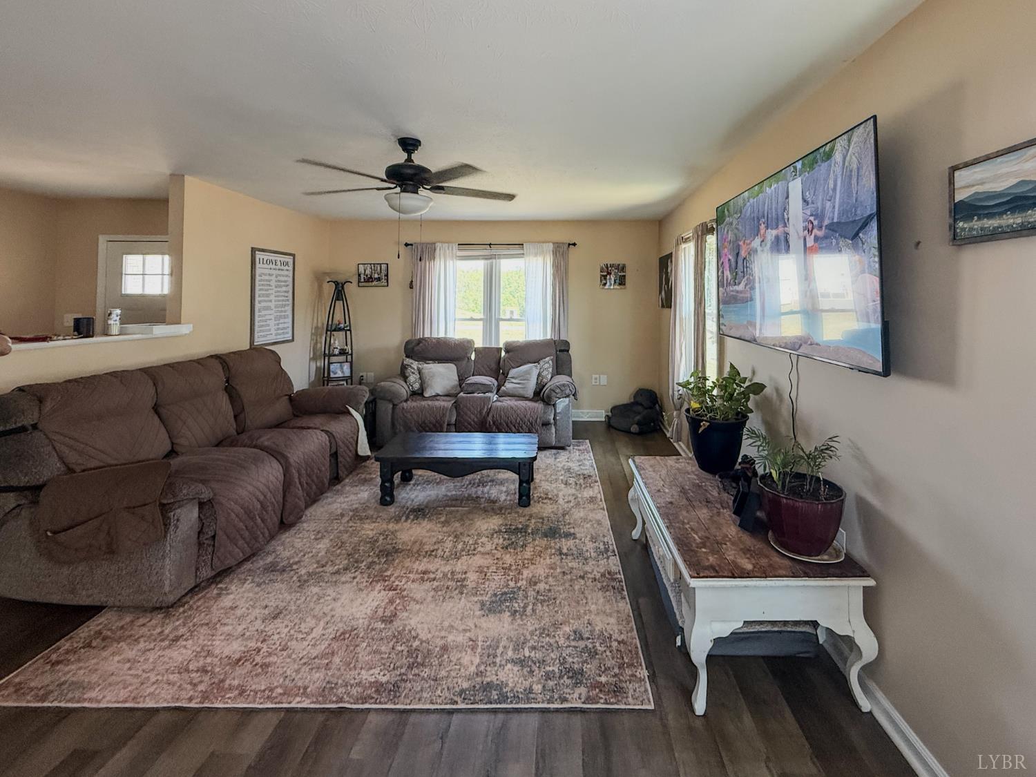 95 Midgett Farm Road Concord, VA 24538 - Photo 7 of 20 a living room with furniture and a potted plant