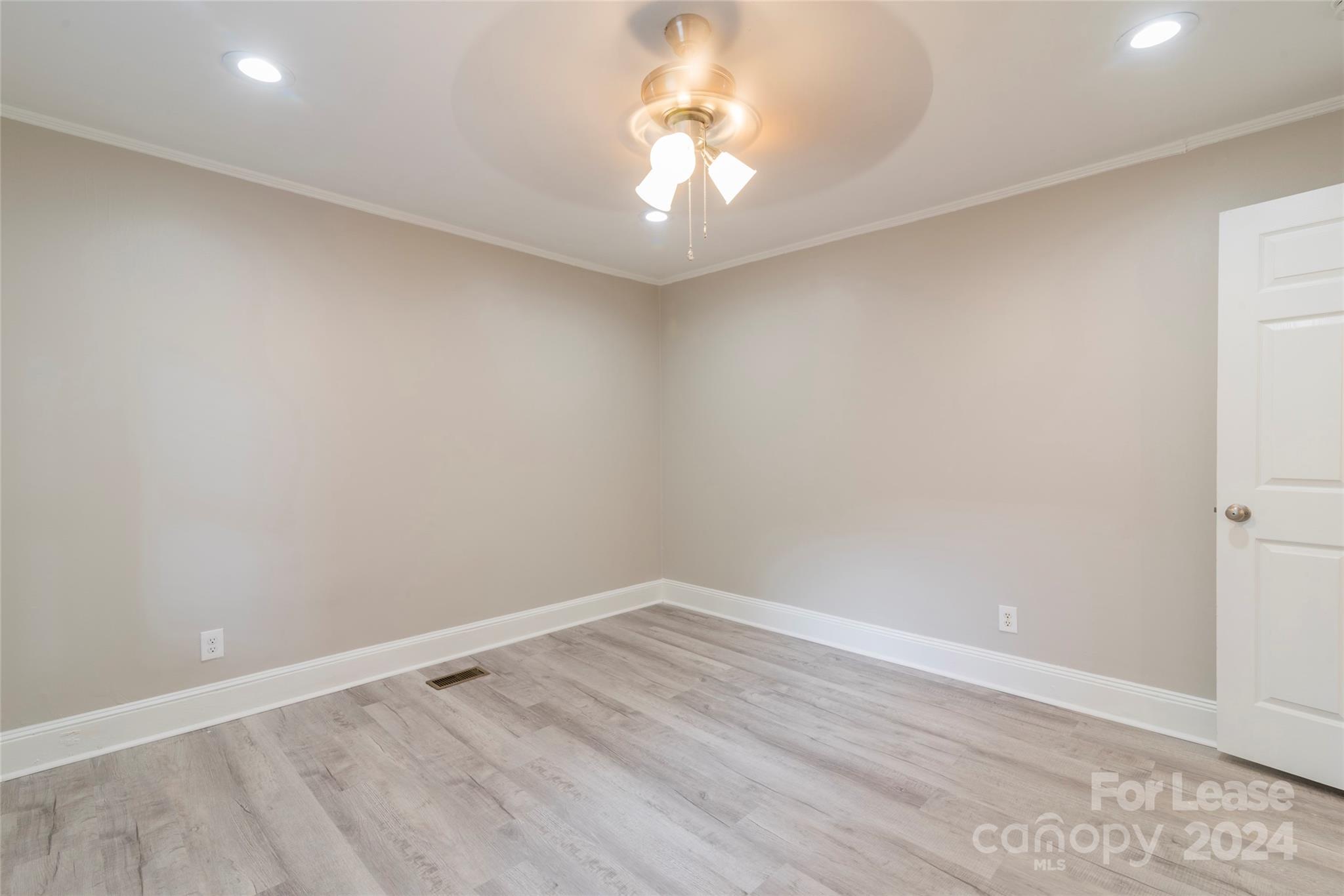 2336 Barry Street, Unit B Charlotte, NC 28205 - Photo 13 of 18 wooden floor in an empty room