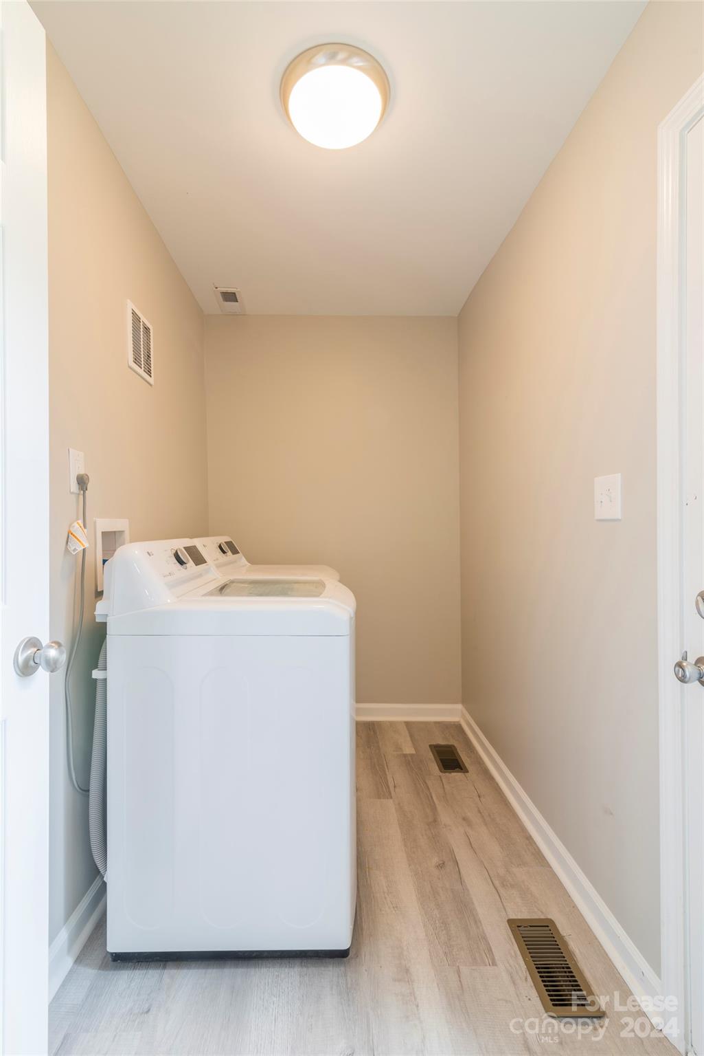 2336 Barry Street, Unit B Charlotte, NC 28205 - Photo 18 of 18 a utility room with dryer and washer