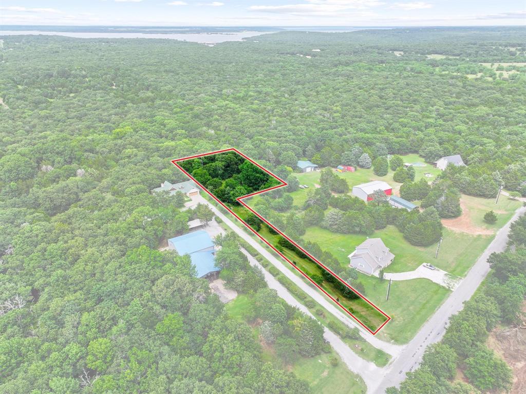 207 Paradise Park Road Pottsboro, TX 75076 - Photo 26 of 28 Expansive wooded lot offering significant tree cover and open grassy areas