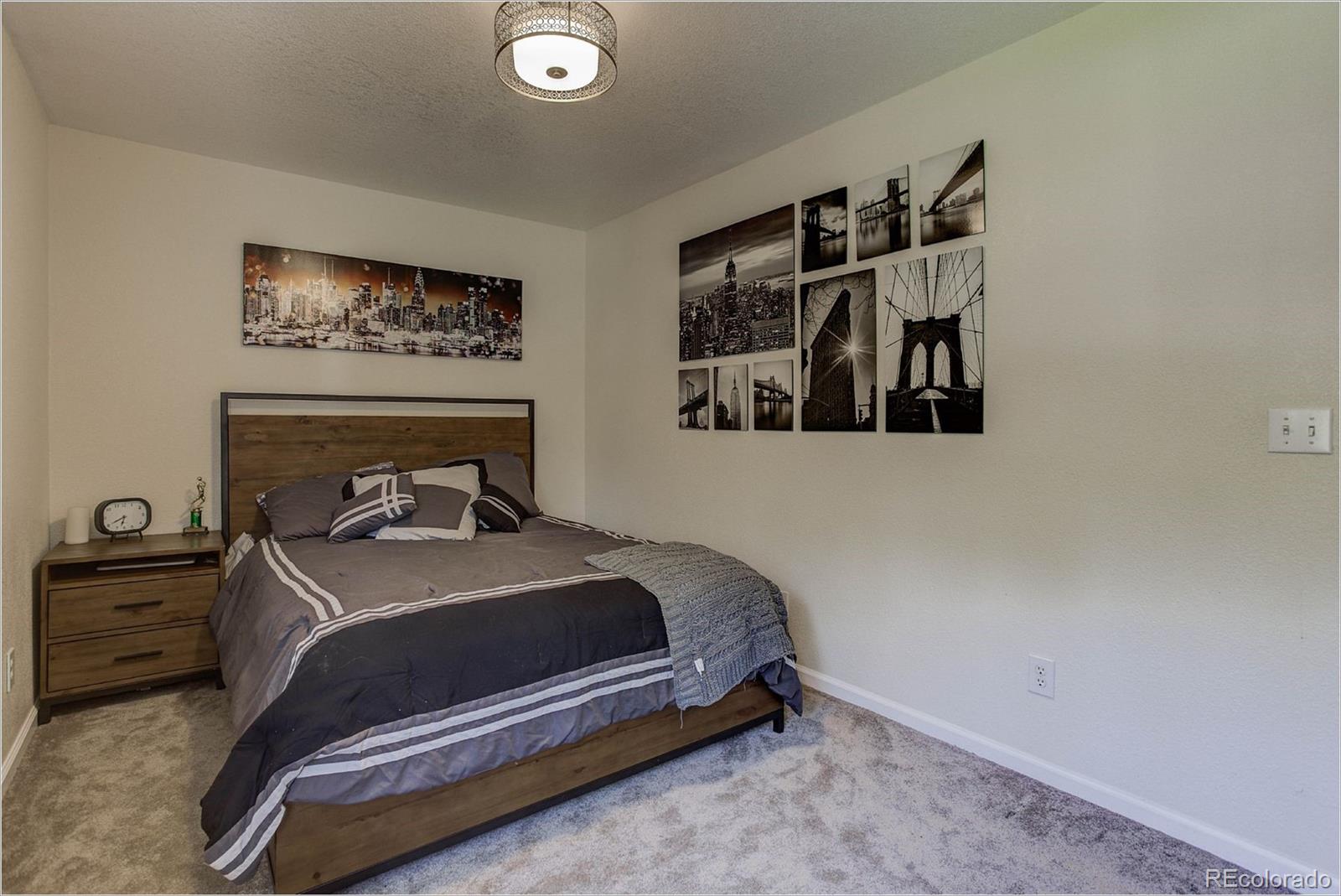 4961 Little Cub Creek Road Evergreen, CO 80439 - Photo 28 of 38 a bedroom with a bed and closet