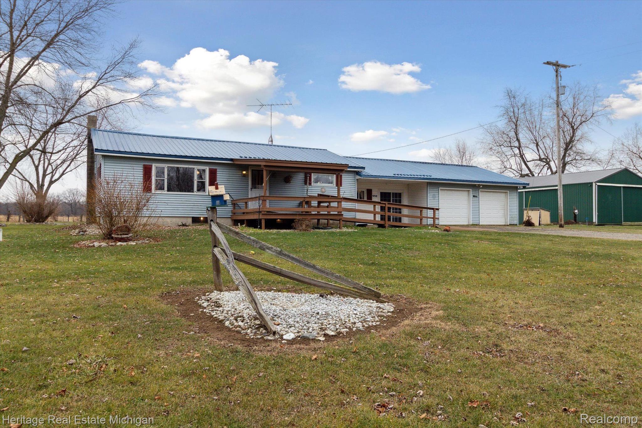 998 Lansing Road Morrice, MI 48857 - Photo 2 of 47 Front of Home