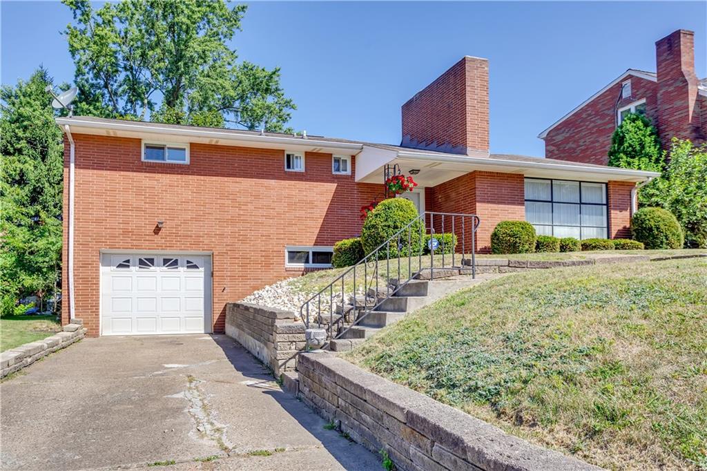 207 Erwin Place McKees Rocks, PA 15136 - Photo 1 of 25 Brick ranch with gorgeous picture window and 1 car garage.