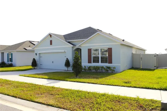 a view of a house with a swimming pool